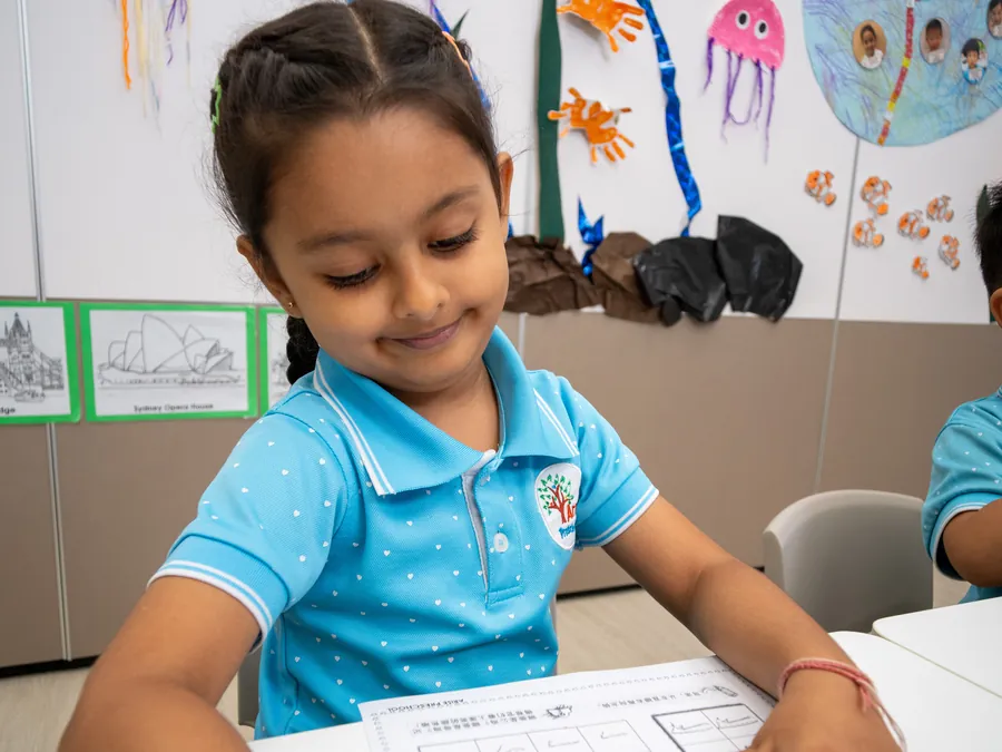 A child focused on writing