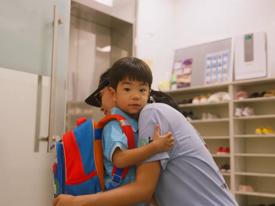 A trusting hug at drop-off