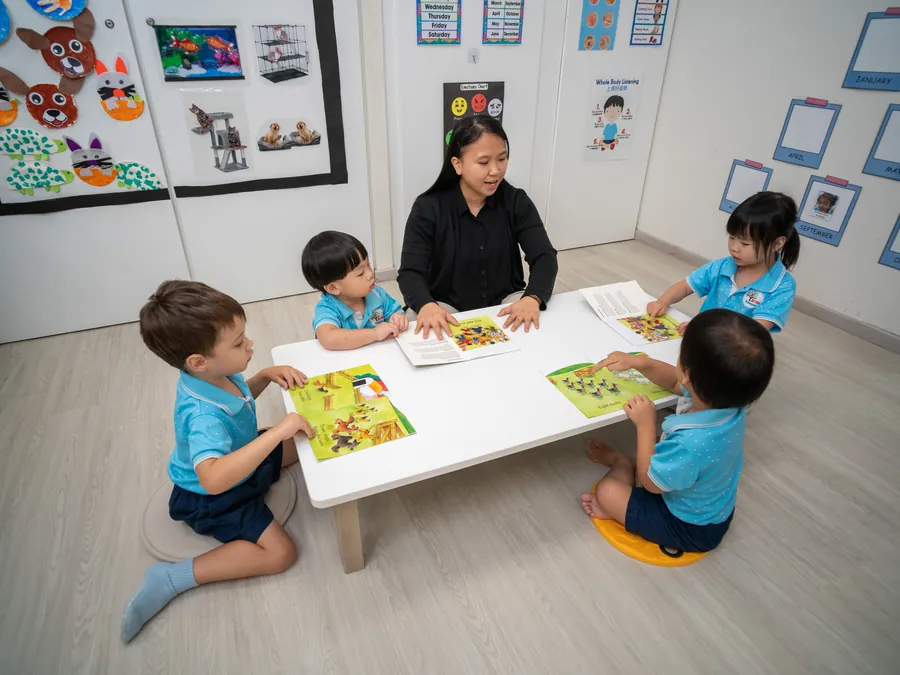 Teacher with a small group at the table